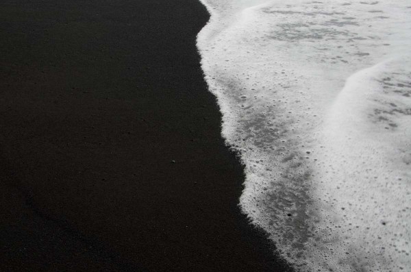 Black sand and white surf on the Big Island's Kaimu Beach