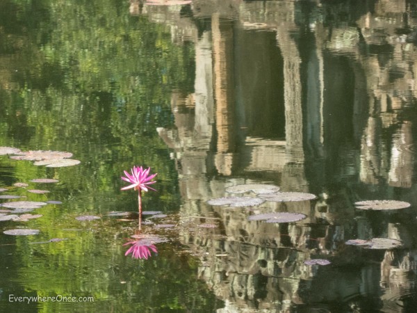 Neak Pean temple reflected in a pond at Angkor Wat