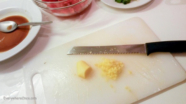 Fulltime travel means always using shitty knives <br> (yes, that's me trying to dice ginger with a freaking bread knife.)